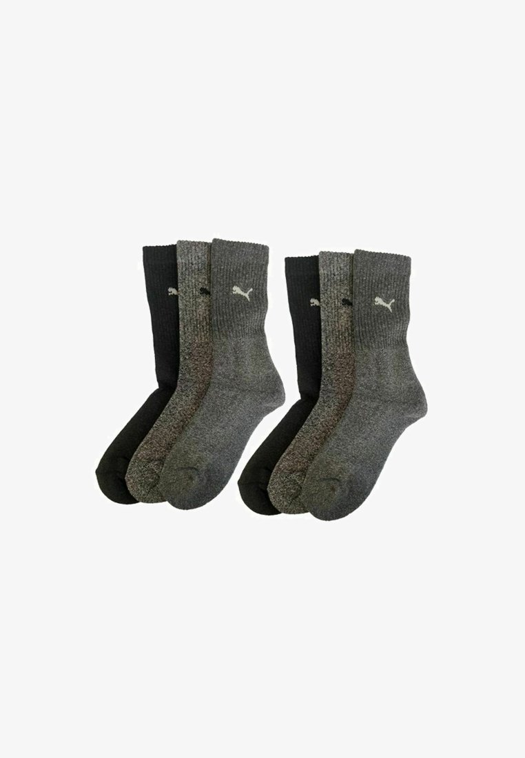 Set aus vier Knöchelsocken in Schwarz und Grautönen. Hergestellt aus einem strukturierten Material, mit dem weißen Puma-Logo an der Seite.