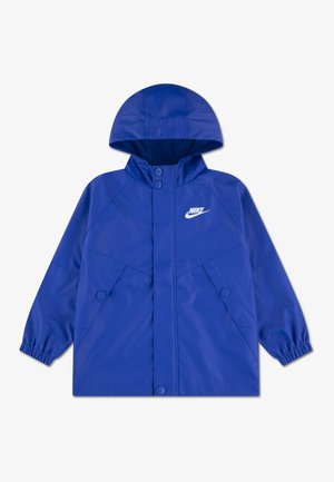 Blue waterproof jacket with a hood, featuring a front snap closure, elasticized cuffs, and a white Nike logo on the chest. Smooth texture.