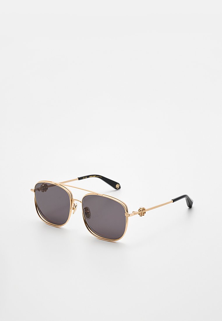 Gold metal sunglasses with dark gray lenses. Square frames feature a textured design on the arms and a braided accent near the hinges.
