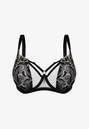 Czarny stanik z koronkowym wykończeniem, zdobiony beżowymi kwiatowymi wzorami. Ramiączka są czarne, z dekoracyjnym detalem na środku i gładką białą bazą.