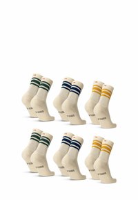 Sats av bomullssockar med krämfärgad bas och gröna, blåa och gula ränder. Ribbad mudd och varumärkeslogotyp nära hälen.
