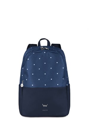 Navyblaue Rucksack mit weißen Punkten, aus strukturiertem Stoff, verfügt über einen oberen Griff, doppelte Schulterriemen und ein markantes Detail am Boden.