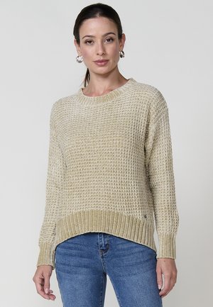 Strickpullover in hellbeige mit strukturiertem Muster, runder Ausschnitt und geripptem Saum. Verfügt über lange Ärmel und einen lässigen Schnitt.