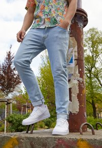 Levi's® 511 SLIM - Calças de ganga de perna direita - light indigo worn in