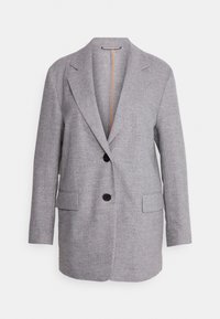 Blazer gris en tissu texturé, doté d'un revers cranté, de deux poches frontales et de deux boutons noirs. Pas de fermeture visible.