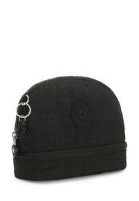 Black nylon cosmetics pouch with a rounded top, zip closure, textured surface, and a rubber logo patch. Includes a small monkey keychain.