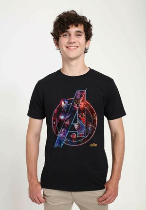 Black cotton t-shirt featuring a vibrant Avengers graphic. The design includes characters like Iron Man and Thanos within a circle and stylized letter "A."