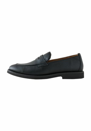Black leather men's loafer with textured surface, slip-on style, low heel, and a strap detail across the upper.