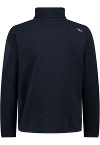Veste polaire bleu marine foncé à manches longues, col montant, patch discret à l’épaule et petit logo sur le haut du dos à droite.