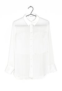 White long-sleeve shirt with a collared neck, button front, and sheer upper panels, featuring long sleeves with button cuffs and a slightly curved hem.