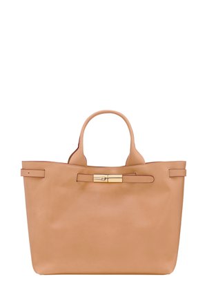 Tan leather tote bag with two top handles, a gold-tone clasp, and minimal stitching, featuring a smooth texture and open design.