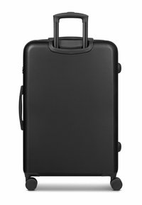 Valigia rigida nera con superficie texturizzata, manico retrattile, manico laterale e quattro ruote per una facile mobilità.