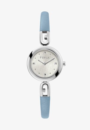 Orologio rotondo in tonalità argento con quadrante bianco testurizzato e cinturini in pelle blu, dotato di una fibbia con logo distintivo e dettagli argentati.