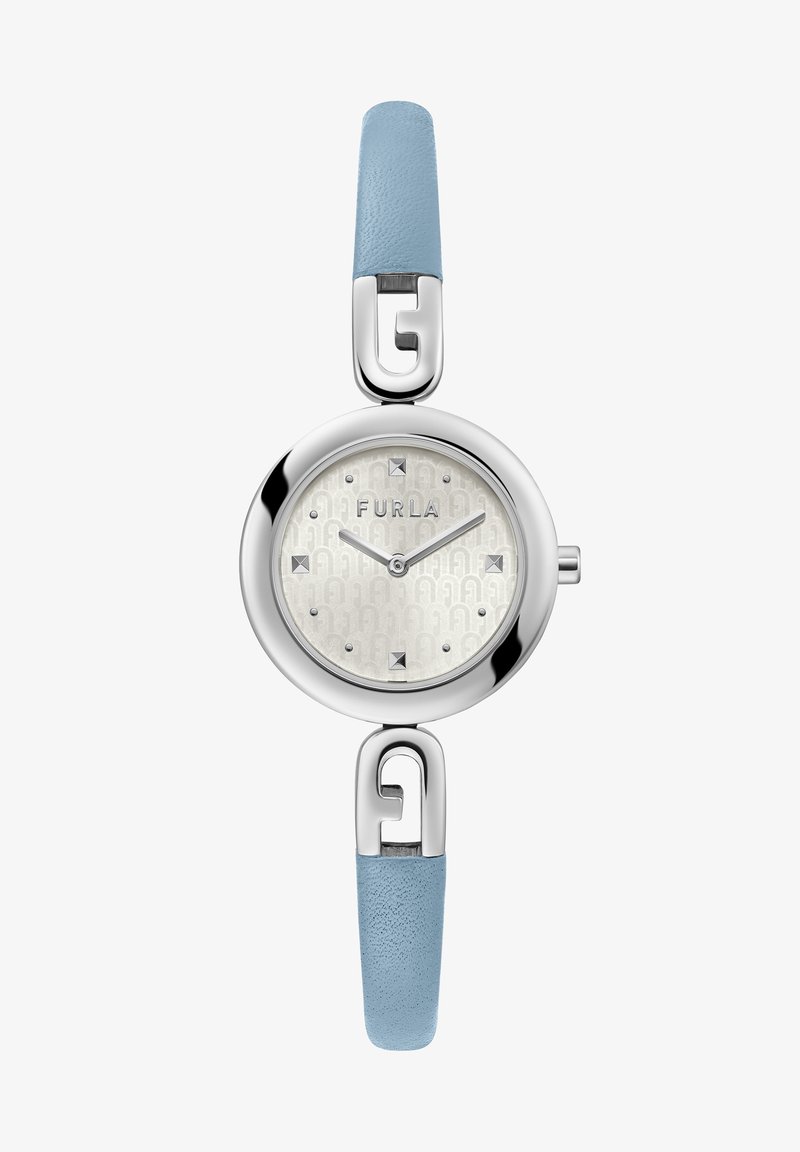 Apvalus sidabro tono laikrodis su tekstūruotu baltu ciferblatu ir mėlynomis odinėmis dirželiais, turintis išskirtinę logotipo sagtį ir sidabro akcentus.