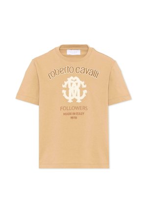 Camiseta beige de manga corta con el texto "roberto cavalli", un logo decorativo y "FOLLOWERS MADE IN ITALY 1970" bordado en la parte delantera.