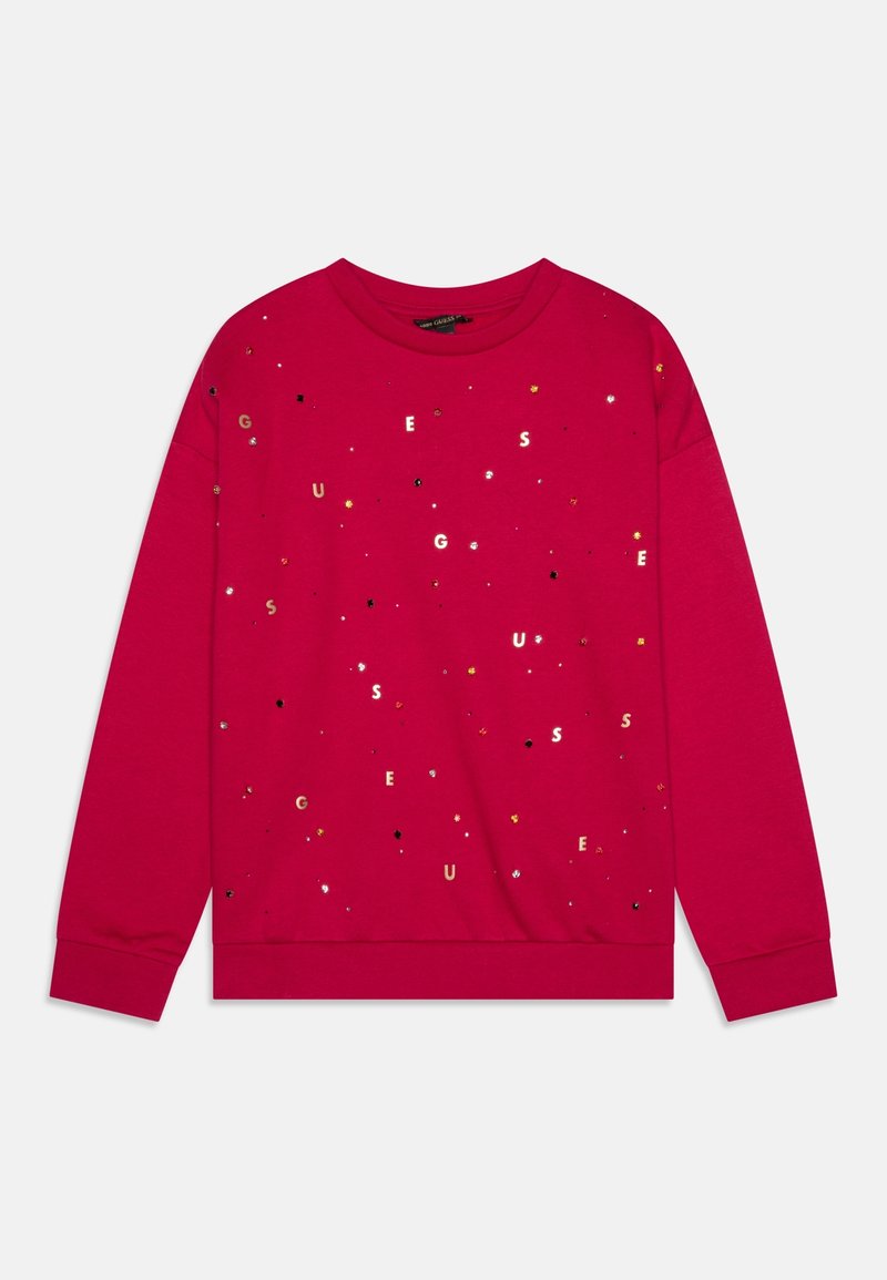 Un sweat-shirt rouge en coton doux, avec des lettres métalliques et en sequins, un col rond et des manches longues avec des poignets côtelés.