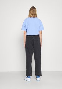 Weekday GALAXY LOOSE STRAIGHT - Calças de ganga folgadas - washed black