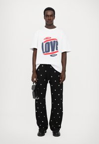 Fiorucci - METAL BUBBLE ELASTICATED TROUSERS UNISEX - Pantaloni - black Immagine in miniatura 1