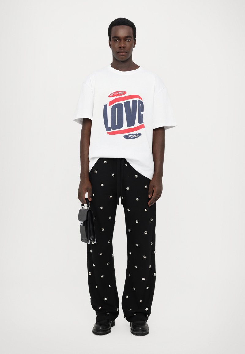 Fiorucci - METAL BUBBLE ELASTICATED TROUSERS UNISEX - Pantaloni - black, Ingrandire