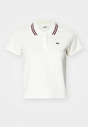 Valge polo särk marooni triibulise krae, nööbistusega, lühikeste varrukatega ja tekstureeritud kangaga. Esiküljel on väike logo.