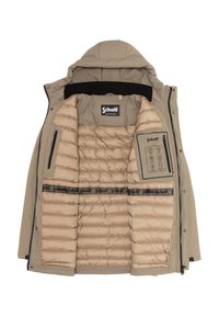 Chaqueta acolchada beige con capucha y detalles en negro. Por dentro cuenta con un forro acolchado y un panel de control para la calefacción. Logo de Schott en exhibición.
