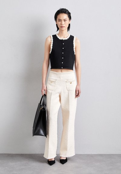 sandro CARDIGAN SANS MANCHE DETAIL GIRLY - Brezrokavnik - noir