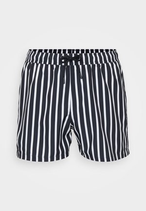Black and white striped swim shorts with a drawstring waistband and a relaxed fit, made from lightweight fabric.