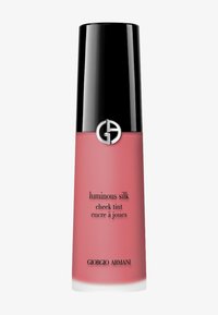 Giorgio Armani Luminous Silk Cheek Tint in una bottiglia traslucida rosa con un tappo nero lucido e un logo argentato. Testo sulla bottiglia in nero.