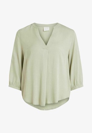 Hellgrüne Bluse mit V-Ausschnitt, Dreiviertelärmeln mit gerafften Manschetten und einem abgerundeten Saum für eine lässige Passform. Glatte, weiche Textur.