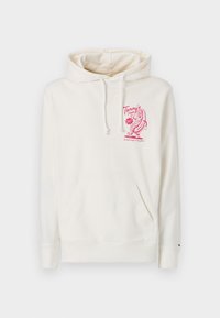 Crème hoodie van zachte stof, voorzien van een kangoeroezak en een roze grafisch ontwerp met tekst op de voorkant. Koordjes bij de capuchon.