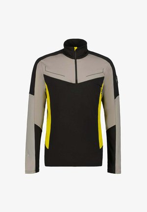 Pitkähihaisen puseron, jossa on korkea kaulus, valmistettu mustista, harmaista ja keltaisista paneeleista, joissa on erottuvat saumat ja vetoketju edessä.