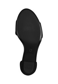 Black high-heeled shoe sole featuring a smooth, rounded shape, textured surface for grip, and reinforced heel area with branding details.