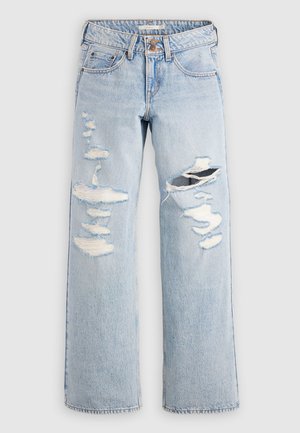 Jasnoniebieskie dżinsy z denimu o luźnym kroju, z efektami przetarć, rozdarć i postrzępionych krawędzi. Klasyczny krój z pięcioma kieszeniami.