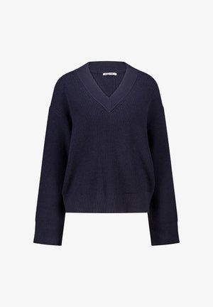 Marineblauwe gebreide trui met een V-hals, wijde mouwen, ribbeltextuur en een ontspannen pasvorm. De stof lijkt zacht en dik te zijn.