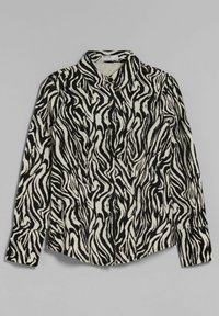 Black and white, textured button-up shirt featuring a wavy zebra print pattern, fold-over collar, and long sleeves with buttoned cuffs.