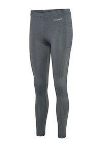 Ciemnoszare obcisłe legginsy sportowe z bocznymi kieszeniami i widocznym przeszyciem, z małym logo hummel w pobliżu talii.