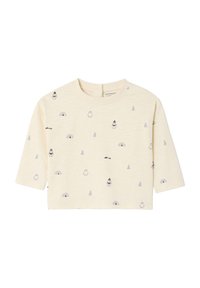Light yellow cropped long-sleeve shirt featuring small gray penguin and igloo patterns, with a round neckline and back button closure.