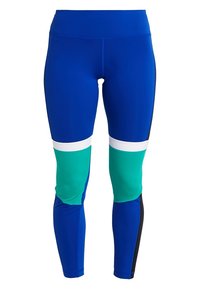 Blå leggings med färgblockerad design och teal- och vita ränder. Tillverkade av en stretchig och slät tyg. Sitter tight runt benen.