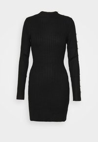 Robe mini manches longues en maille côtelée noire avec un col haut et des détails de boutons en perle le long d'une manche.