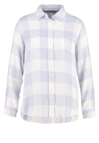 Blå og hvid ternet skjorte med lange ærmer, krave, frontlomme og knaplukning. Letvægtsstof med en let struktureret overflade.