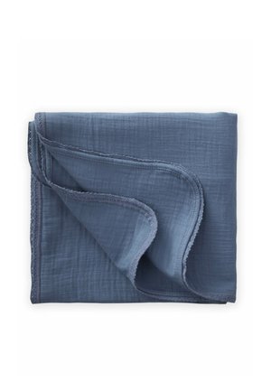 Soft blue muslin fabric folded with one corner turned, featuring a delicate stitched edge trim on a white background.