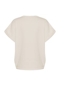 Lühikeste varrukatega, vabalt langev topp pehme koorevalge kangaga, millel on ümmargune kaelus, allavooderdatud õmblused ja lahtine siluett.