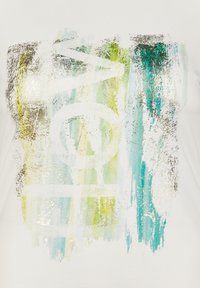 White t-shirt featuring a multicolored abstract print in light green, blue, and silver accents, with a textured graphic design.