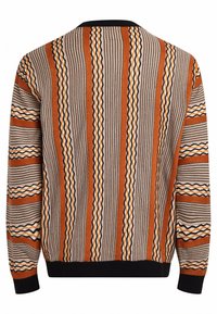 Knitted sweater featuring vertical stripes in orange, gray, and white. Textured fabric with a black ribbed collar and cuffs.