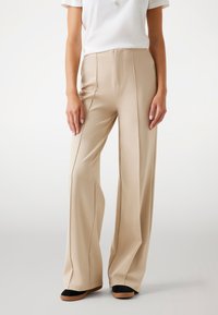 CARLA FLARE  - Pantaloni - beige