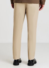 Calliope Pantalon classique - beige scuro