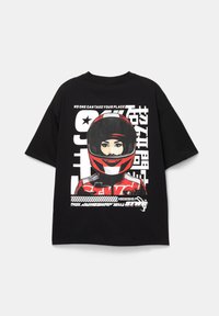 Black t-shirt featuring a graphic print of a woman in a red racing helmet, with white text and accents in a sporty design.