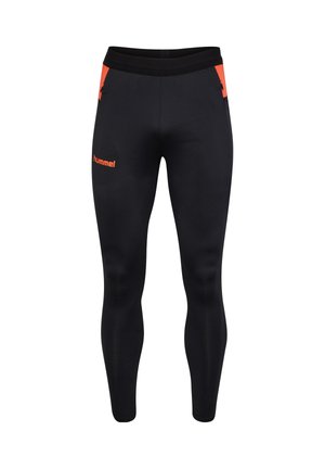 Leggings deportivos negros hechos de tela elástica, con un logo naranja en el muslo izquierdo y detalles en naranja contrastante en los laterales.
