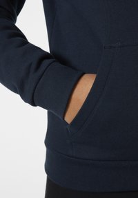 Helly Hansen CORE - Jersey con capucha - blau