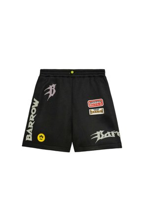 Black sports shorts with multiple Barrow logos, a yellow smiley face patch, and graphic text on the front sides and waistband.